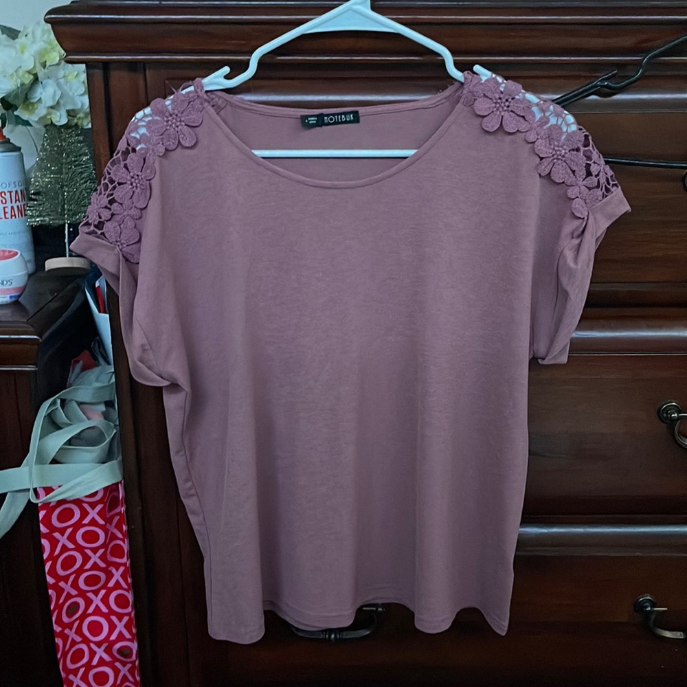 Nice blouse with flowers on the shoulders